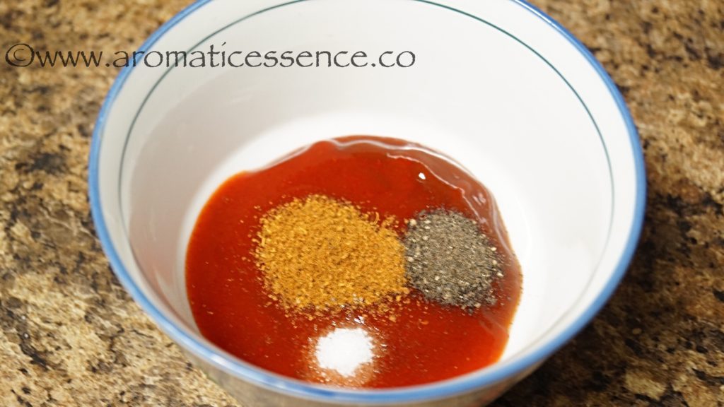 in a bowl combine the red chilli sauce, tomato ketchup, garam masala,  sugar, salt, and pepper.