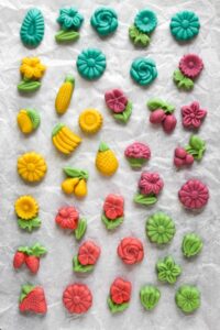 Cashew marzipan arranged on a crumpled parchment paper