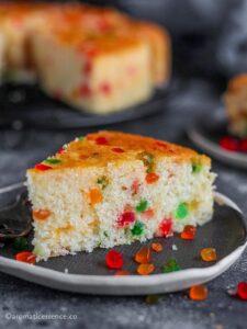 Close-up shot of a slice of eggless sooji cake