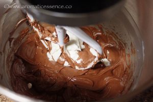 adding sour cream to chocolate cheesecake batter