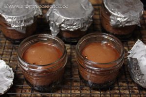 baked chocolate cheesecake in jars