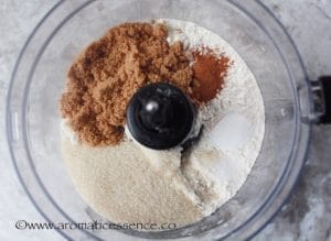 Add flour, baking powder, cinnamon, sugars, and salt in the bowl of a food processor