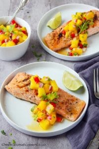 Pan-seared salmon served with fresh mango salsa.