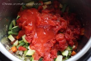Add diced tomatoes and tomato sauce