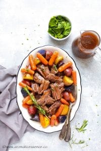 Pressure cooker pot roast served in a white oval platter