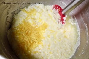 Add almomd extract, lemon juice, and zest