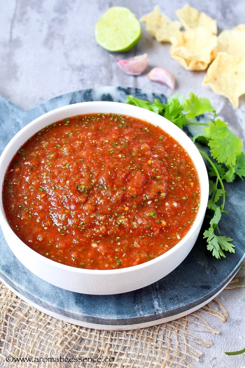 Restaurant style salsa served in a white bowl