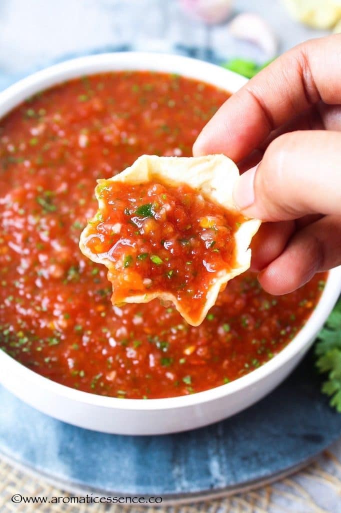 tostitos scoop filled with salsa