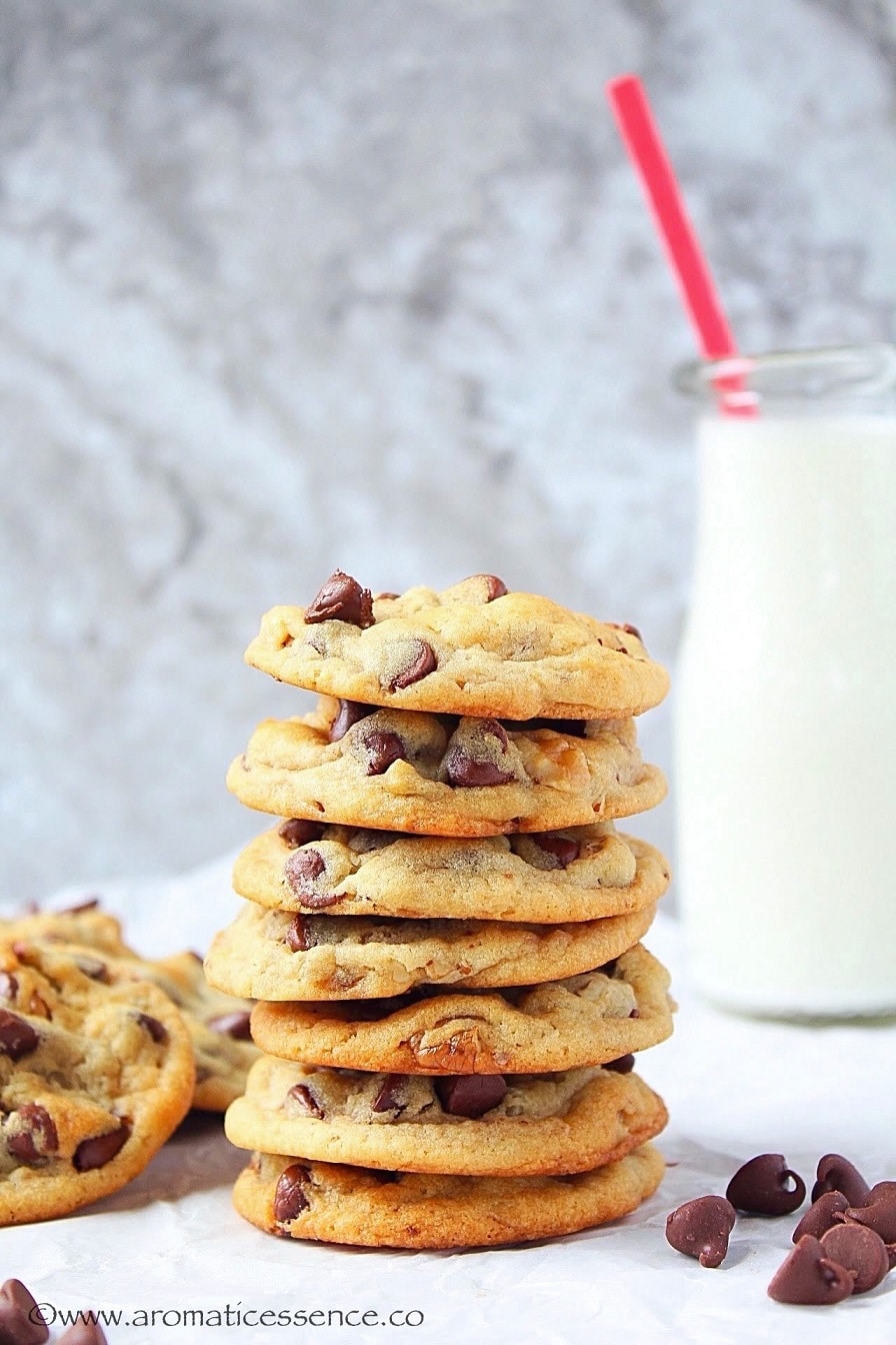 Chocolate chip cookies without eggs, stacked over the other.