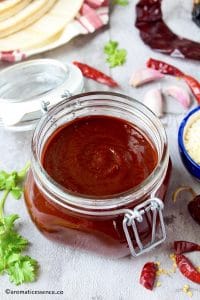 Red enchilada sauce in a jar