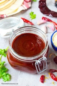 Red enchilada sauce in a jar