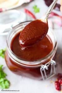 Enchilada sauce on a spoon