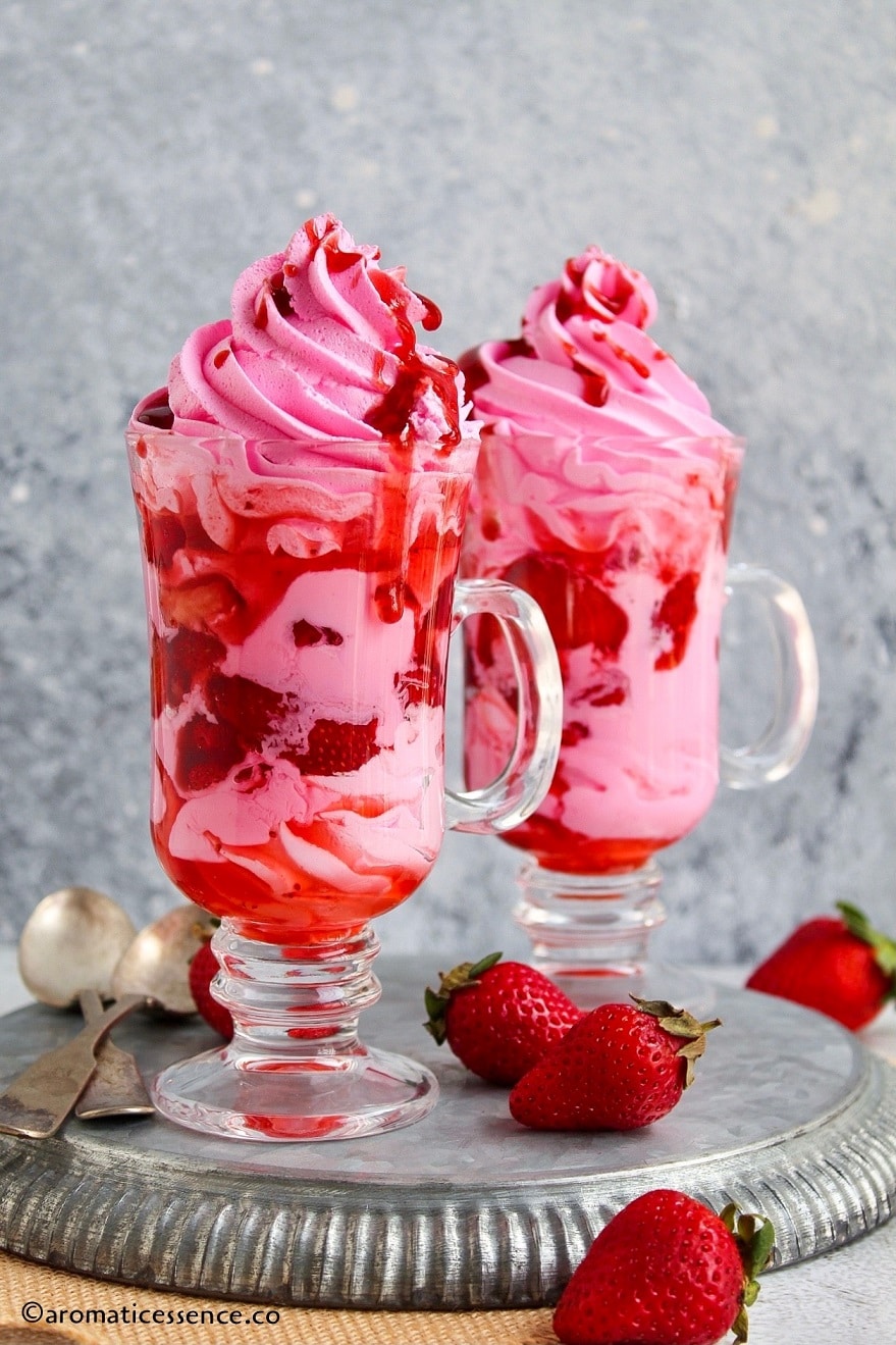 Strawberries and cream served in two glasses