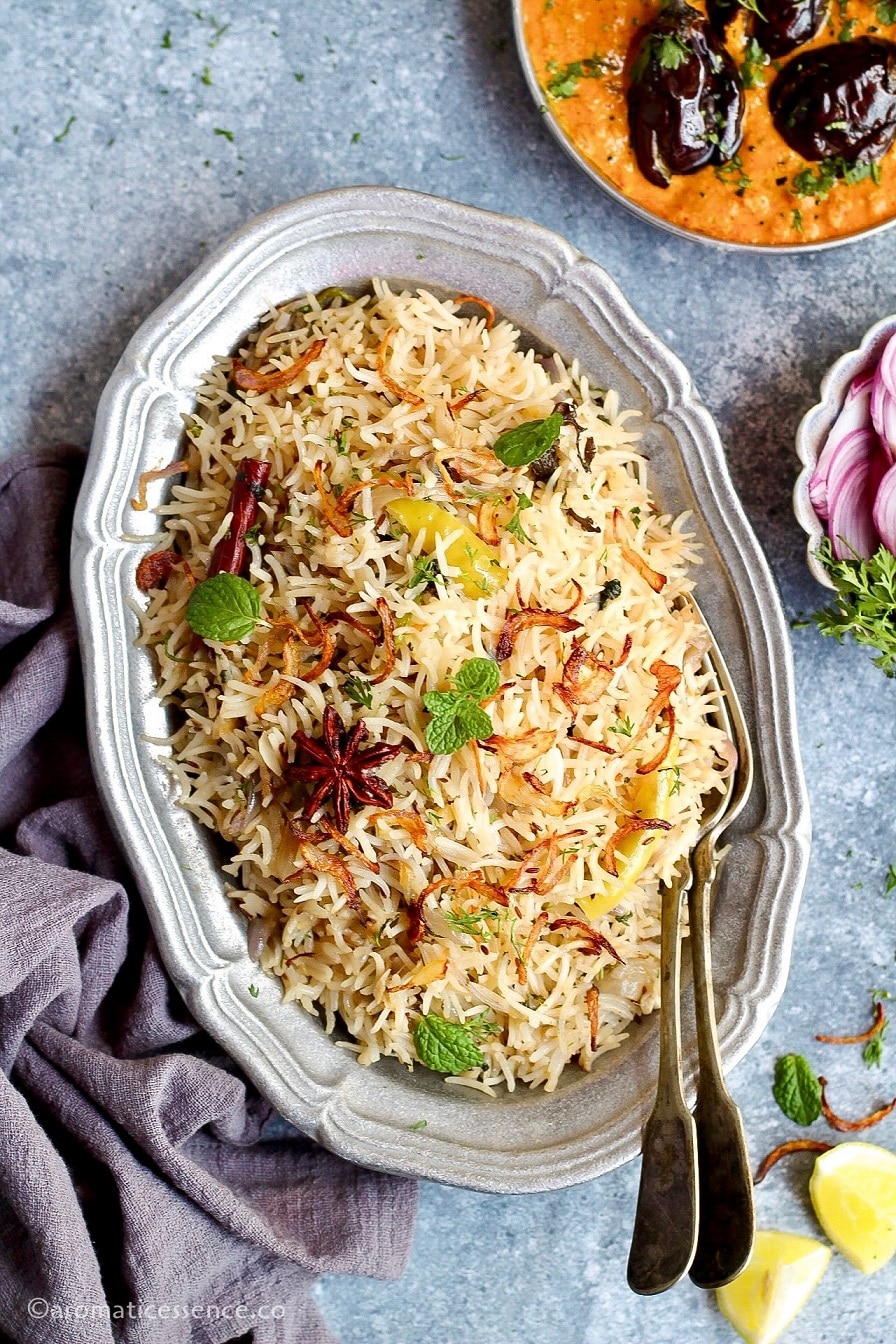 Hyderabadi bagara chawal served with bagara baingan