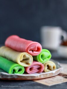Alle belle stacked on a white irregular ceramic plate