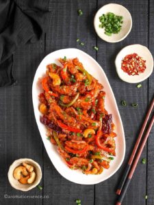 Overhead shot of dragon chicken served in a white oval platter