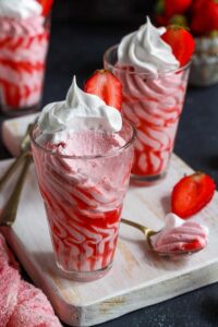 Strawberry mousse scooped with a spoon